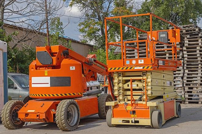 forklift in action at busy industrial warehouse in Lauderdale, MN